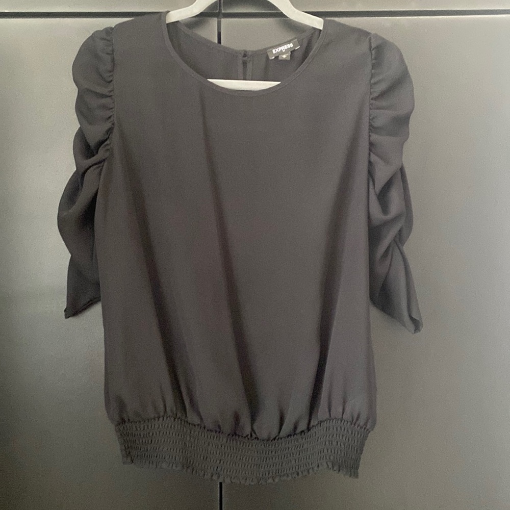 Black dressy top with scrunch sleeves and cinch at bottom
